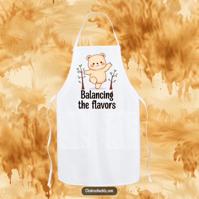 Funny apron depicting a chubby bear humorously attempting a yoga pose on one leg, arms outstretched, ideal for kitchen fun.