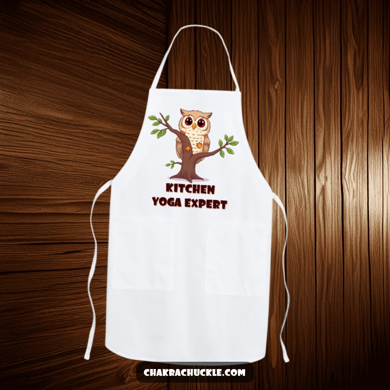 Funny owl yoga apron showing a curious owl attempting a wobbly tree pose, perfect for keeping clothes clean during culinary adventures.