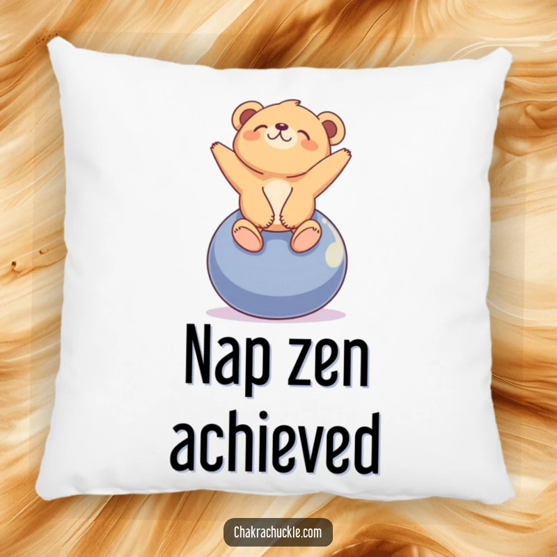 Funny tiny bear cub pillow with a cub blissfully balancing on a yoga ball, looking peacefully upwards.