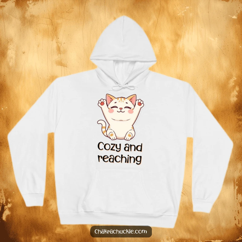 Funny Cat Yoga Hoodie: A smiling cat stretches its front paws upwards in a peaceful, contented pose, perfect for lounging.