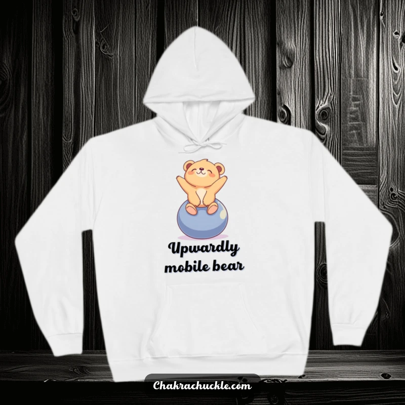 Funny tiny bear cub hoodie with a cub blissfully balancing on a yoga ball, looking peacefully upwards.