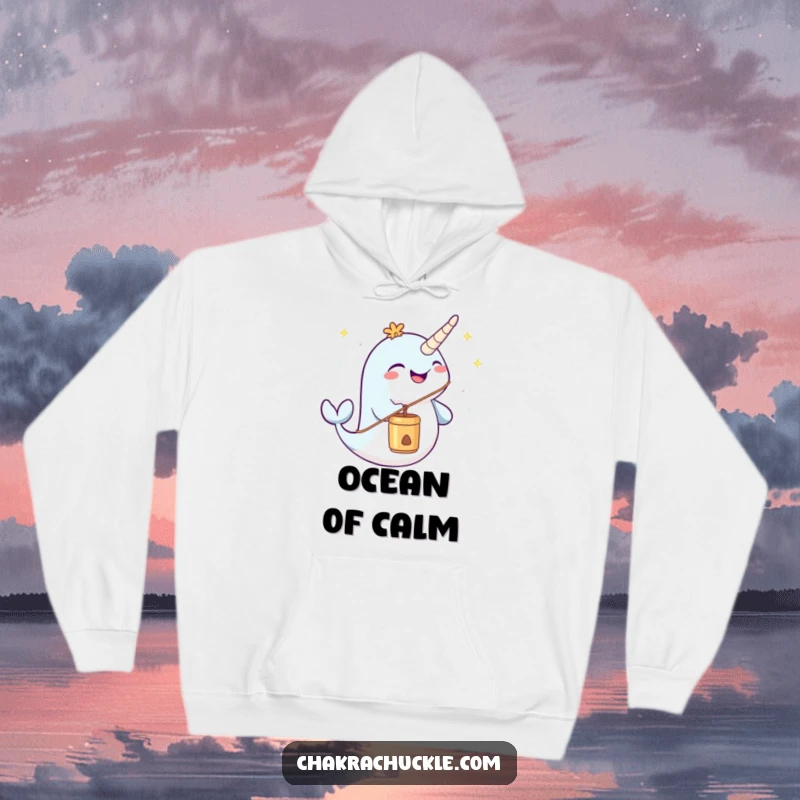 Funny cozy narwhal hoodie joyfully blowing a meditation chime, offering comfort and peaceful humor.