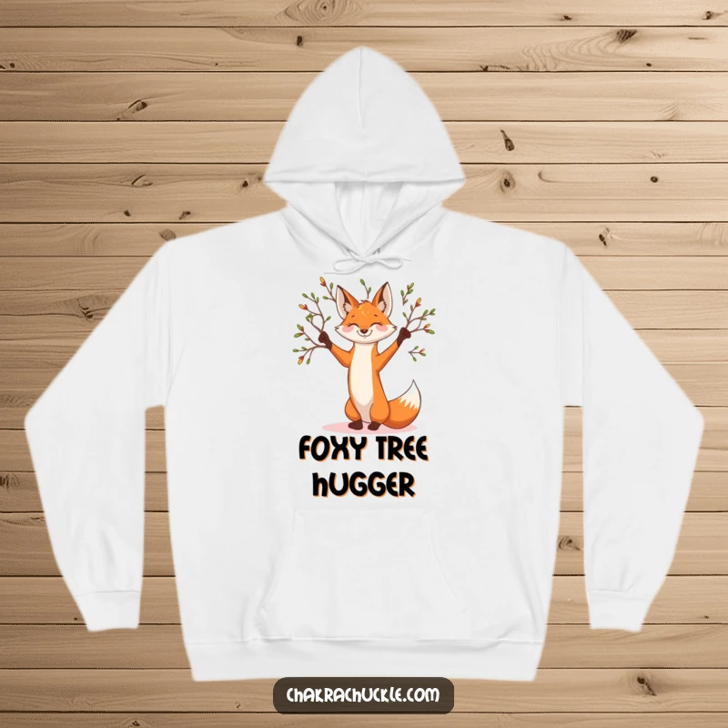 Funny smiling fox hoodie in a graceful tree pose, branches reaching out, offering cozy woodland comfort.