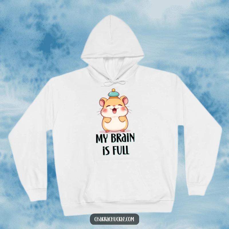Funny hoodie featuring a giggling hamster meditating with a tiny cushion balanced on its head, offering humorous comfort.