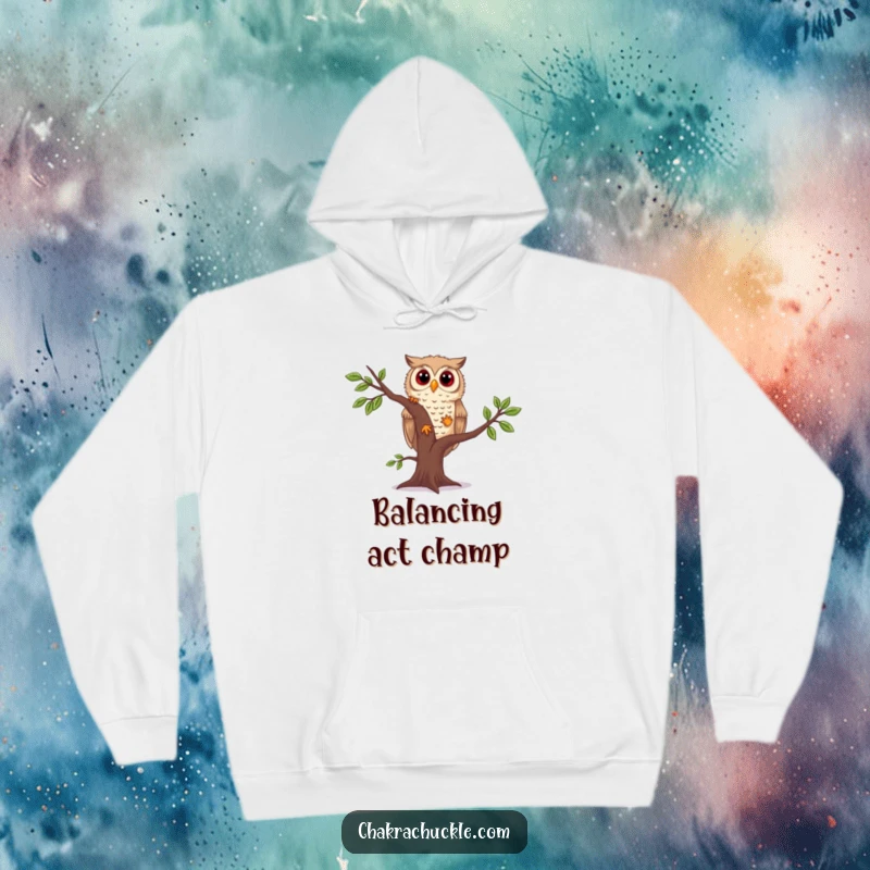 Funny owl yoga hoodie showing a curious owl wobbling slightly in tree pose, symbolizing the fun journey of practice and learning.