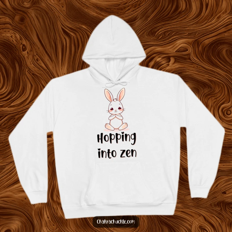 Funny hoodie featuring a cute yoga bunny in a seated pose with one leg gracefully extended, offering serene comfort and humor.