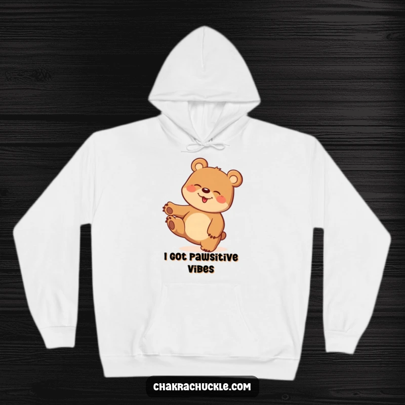 Funny hoodie with a design of a delighted bear attempting a one-paw stand in a funny, playful balance.