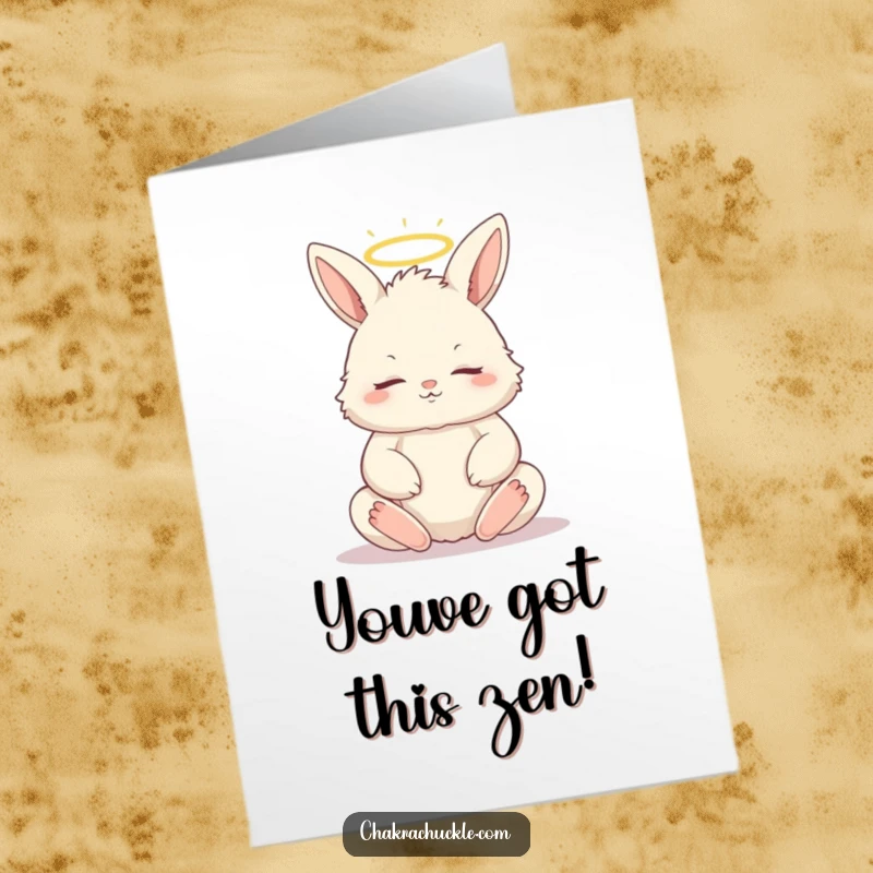 Free printable congratulations card showcasing a fluffy bunny in lotus pose, eyes closed, haloed, signifying serene accomplishment.