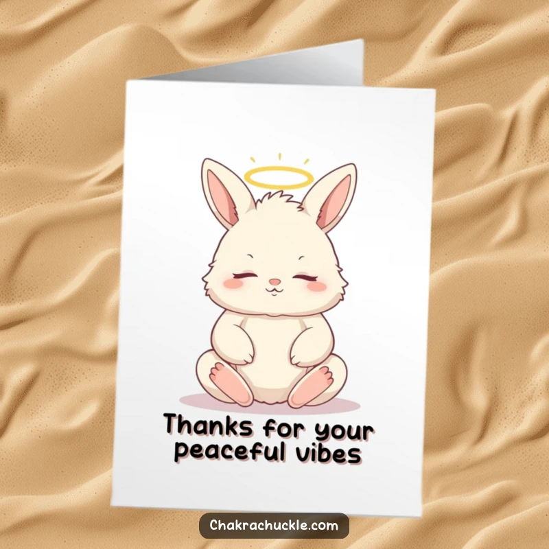 Free printable thank you card of a fluffy bunny in lotus pose, eyes closed, haloed, conveying peaceful gratitude.