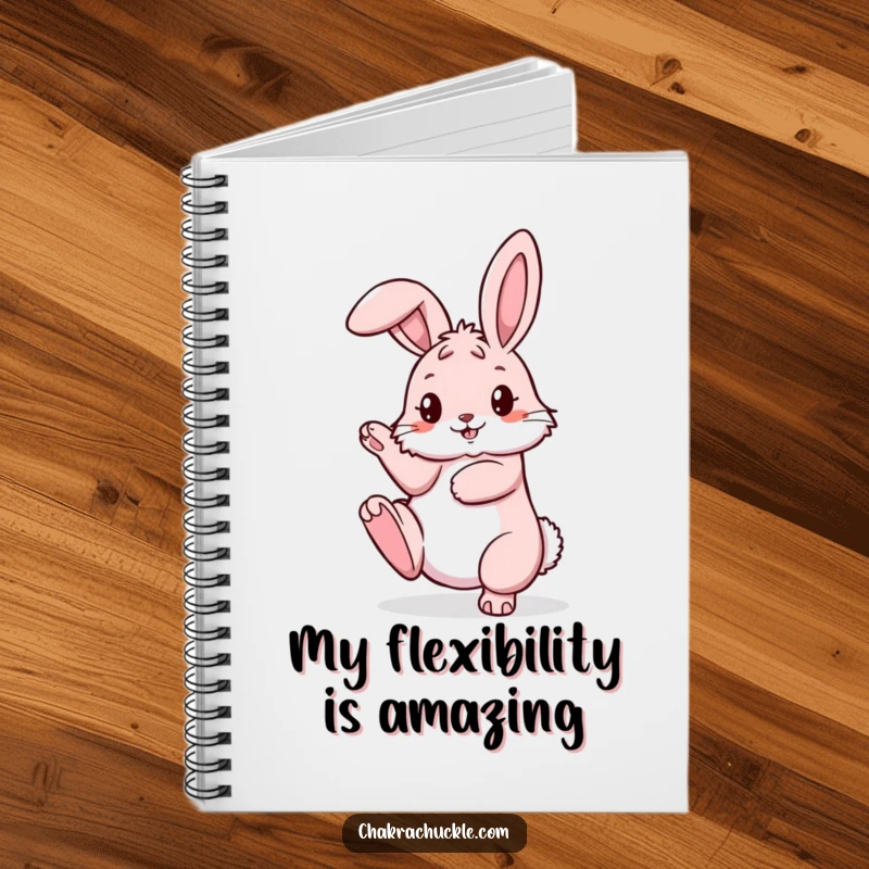 Funny pink bunny notebook in a pretzel pose with one leg raised, ideal for jotting down flexible ideas.
