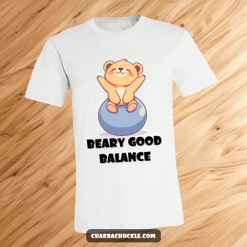 Funny tiny bear cub t-shirt with a cub balancing on a yoga ball, looking blissfully upwards. Serene.