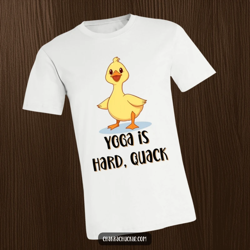 Funny duck t-shirt featuring a wobbly duck attempting a serene lotus pose with humorously unsteady legs, evoking amusement.
