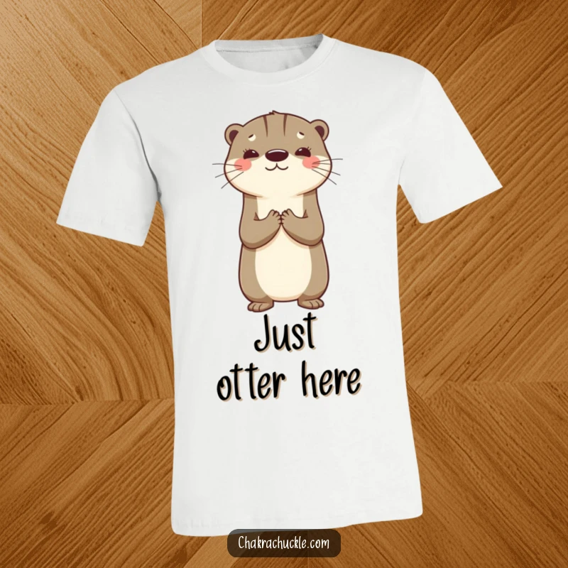 Funny t-shirt with a cute otter balancing on its back, hands in prayer, radiating contentment and playful gratitude.