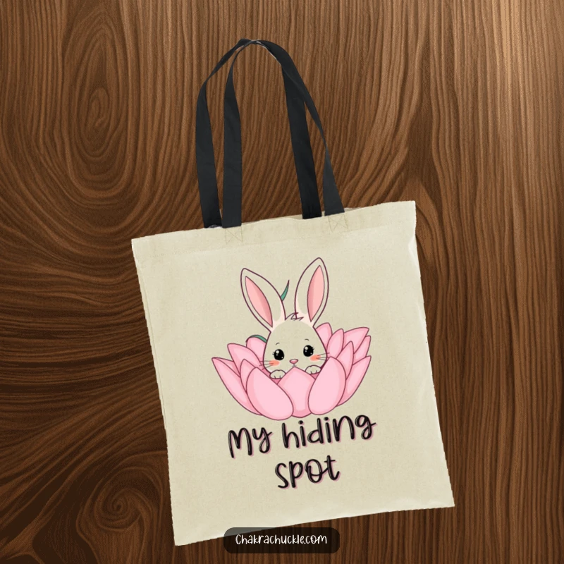 Funny tote bag with a curious rabbit peeking from a blooming lotus flower, perfect for shopping or daily use.